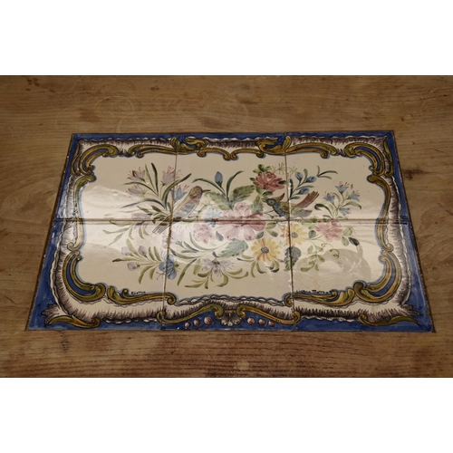 15 - A rustic elm coffee table inset with ceramic tiles, 120 x 62cm, standing 48cm high.