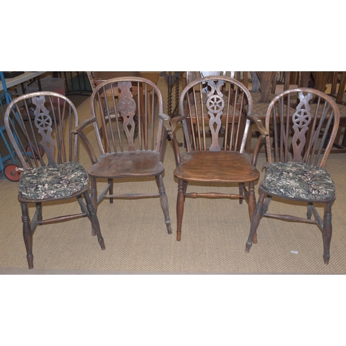 2 - Four elm and beech wheel-back chairs, including two carvers, (4).