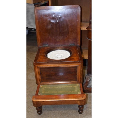21 - A Victorian mahogany hallstand with hat rack, glove box and stick stand, 192cm high, 76cm wide and a... 