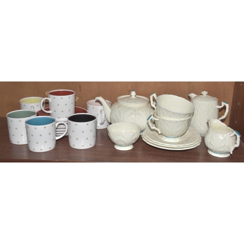 48 - A Crown Devon tea service decorated with pastel colours, approximately eighteen pieces, six each Sus... 