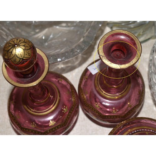55 - Six items from a cranberry and gilt-decorated dressing table set, (no tray), a yellow glass decanter... 