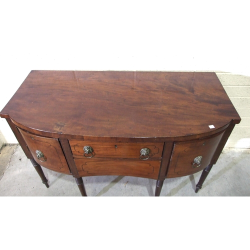 47 - A George IV mahogany and ebony-inlaid sideboard with slightly-bowed outline, having a pair of cupboa... 