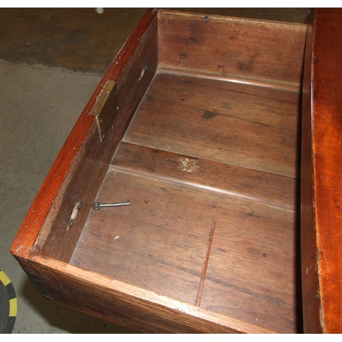 47 - A George IV mahogany and ebony-inlaid sideboard with slightly-bowed outline, having a pair of cupboa... 