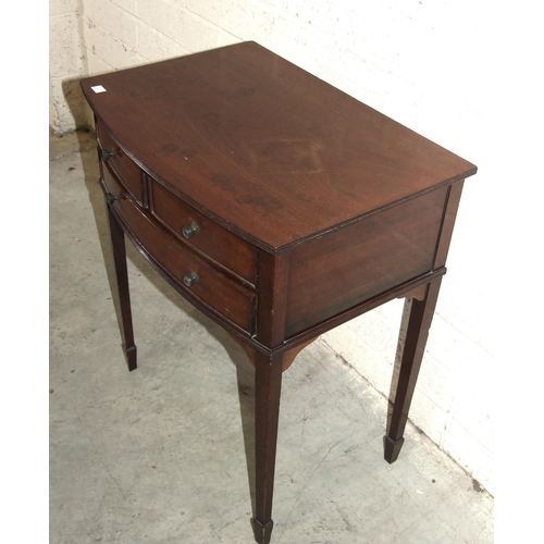 50 - A small 19th century mahogany side table of slightly-bowed shape, having two short and one long draw... 