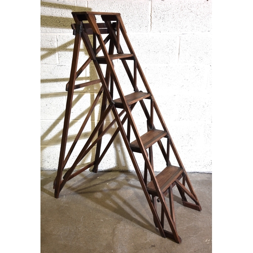 70 - A set of vintage softwood step ladders with five brass-mounted treads and metal mount marked The Hat... 