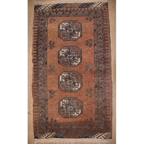 72 - An Oriental rug, 150 x 107cm and two other rugs, (3).