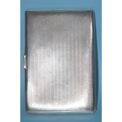 11 - A silver engine-turned rectangular cigarette case, 13 x 8.5cm, Birmingham 1945, maker ES & Co, 2... 