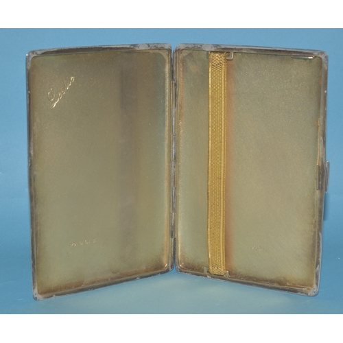 11 - A silver engine-turned rectangular cigarette case, 13 x 8.5cm, Birmingham 1945, maker ES & Co, 2... 