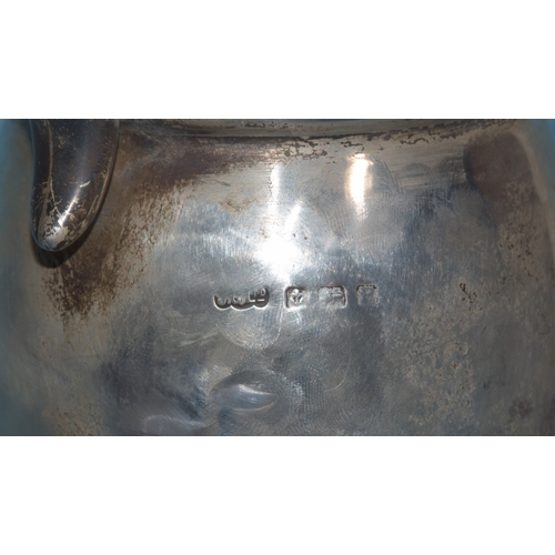 19 - A George VI silver coffee pot with inscription and Bakelite handle and finial, 23cm high, (a/f), Lon... 