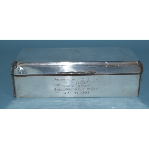 20 - A silver rectangular cigarette box with wood-lined lid and interior, with inscription to front, 17.5... 