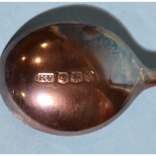 24 - A cased set of six silver 'bean' coffee spoons, Sheffield 1936, two silver napkin rings, a white met... 