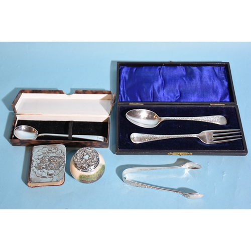 28 - A cased silver christening set (fork and spoon), Sheffield 1911, a silver spoon, a small silver-top ... 