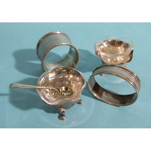 30 - A pair of small silver flower-shaped salts with clear glass liners, 4.5cm diameter, 3cm high, a silv... 