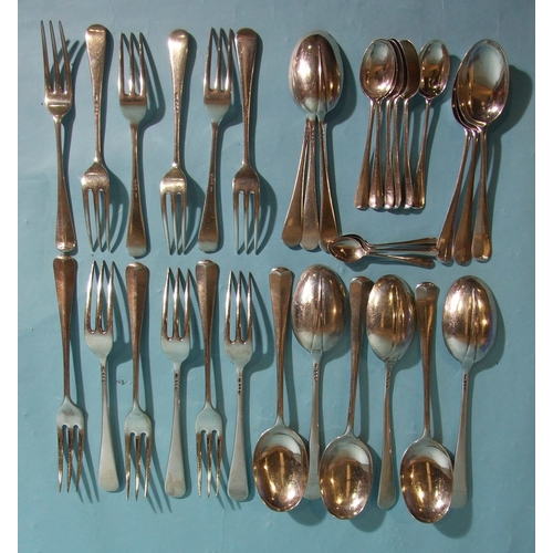 32 - A collection of mid-20th century silver Old English rattail pattern cutlery, comprising: six table f... 