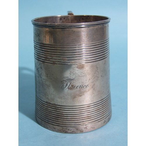 54 - A George III silver cylinder-shaped reeded tankard engraved 