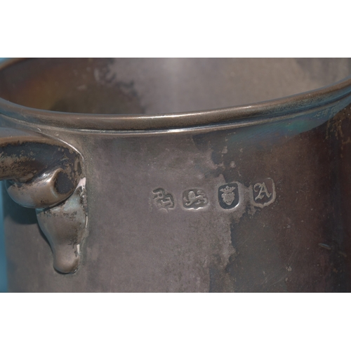 8 - A George II silver tankard of plain form with 'S' shape handle, engraved lion holding an anchor cres... 