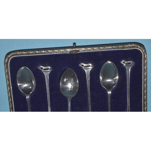 1 - A set of six silver teaspoons with each terminal in the form of an otter and salmon, Sheffield 1929,... 