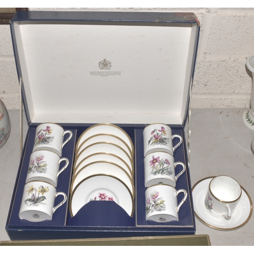 11 - Two Royal Worcester boxed sets of six each coffee cans and saucers decorated with Alpine flowers, (w... 