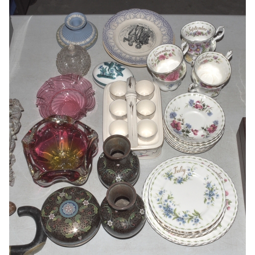 15 - A pair of cloisonné vases with floral decoration, 15.5cm high, (both a/f), a matching circular bowl ... 