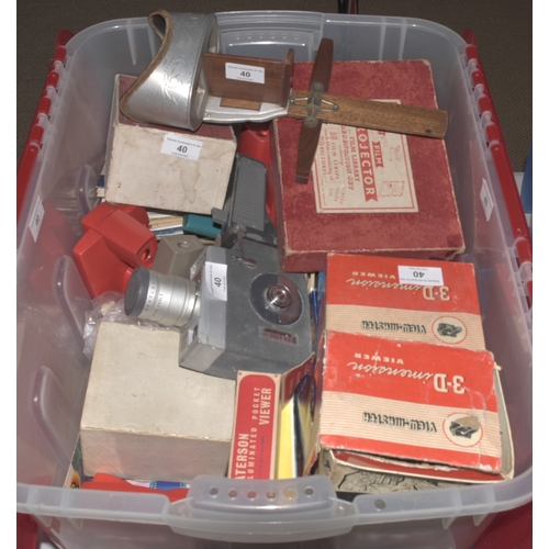 40 - An Underwood & Underwood stereoscopic viewer and cards, a Merit film projector presentation set,... 