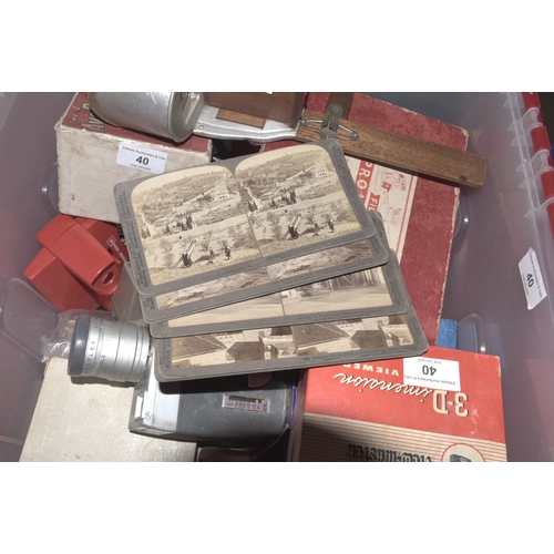 40 - An Underwood & Underwood stereoscopic viewer and cards, a Merit film projector presentation set,... 