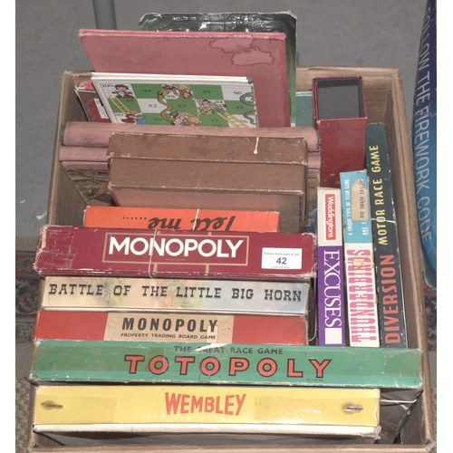 42 - A large quantity of Waddington and other games, a Teksta robotic puppy and other items.... 