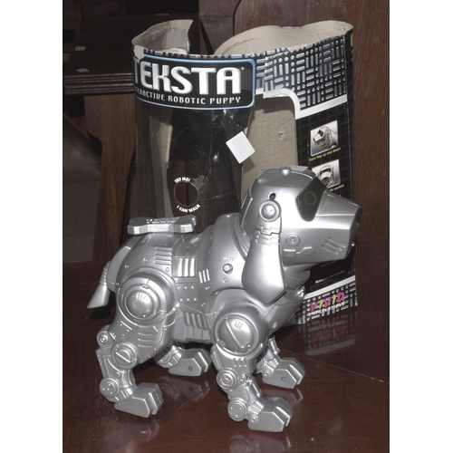 42 - A large quantity of Waddington and other games, a Teksta robotic puppy and other items.... 