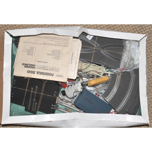 42 - A large quantity of Waddington and other games, a Teksta robotic puppy and other items.... 