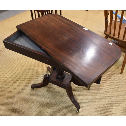 4 - A late-Georgian mahogany and ebony-lined fold-over card table, on central column and four swept legs... 