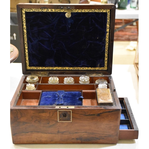 58 - A late-19th century rosewood vanity/dressing case, the lid with central mother-of-pearl oblong plaqu... 
