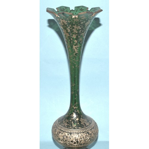 33 - A Continental red and gilt glass lustre vase decorated with vignettes of young women and flowers wit... 