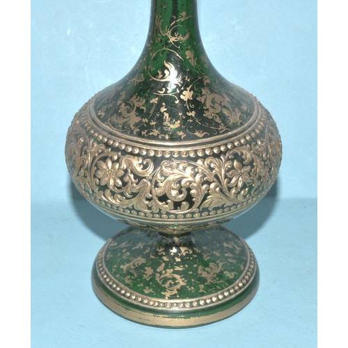 33 - A Continental red and gilt glass lustre vase decorated with vignettes of young women and flowers wit... 