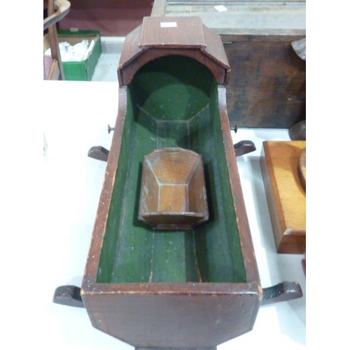 55 - A cased set of twelve each plated dessert knives and forks, a doll's wooden cradle, a wood and glass... 