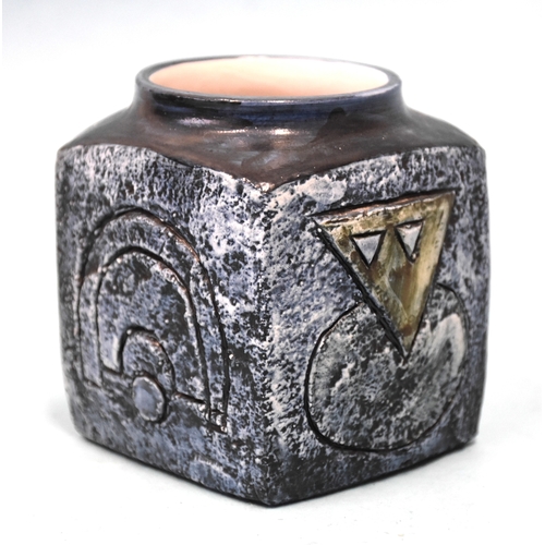 A 1970's Troika Pottery textured marmalade pot of square form, with blue ground and geometric designs, by Teo Bernatowitz, painted marks to base, 9cm high, 8cm wide.