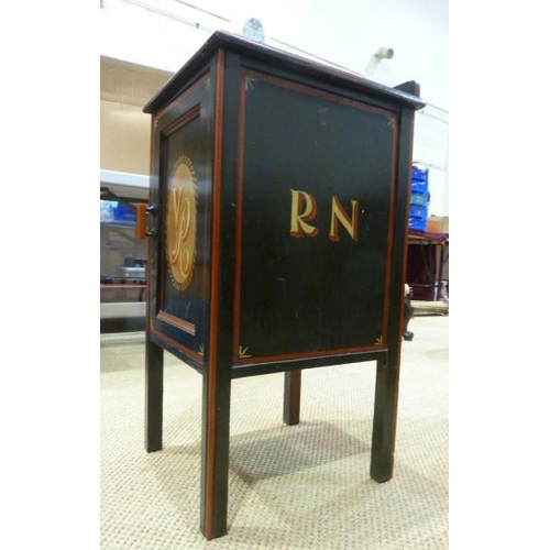 5 - A wooden bedside cupboard, the top painted with a two-masted sailing ship, the sides painted RN and ... 