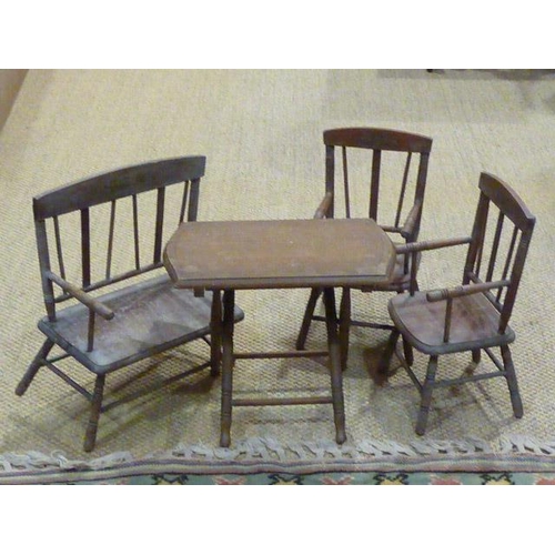 9 - A doll's metamorphic wooden high chair, a pair of doll's chairs and matching settee, (settee a/f, wo... 