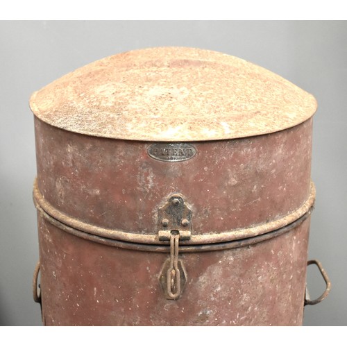 25 - An oil/paraffin drum dispenser, the hinged lid opening to reveal a brass pump and tap, with 
