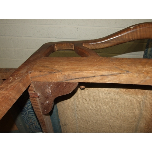 63 - Arthur Romney Green, a walnut reclining chair with adjustable back rest, shaped original open arms a... 