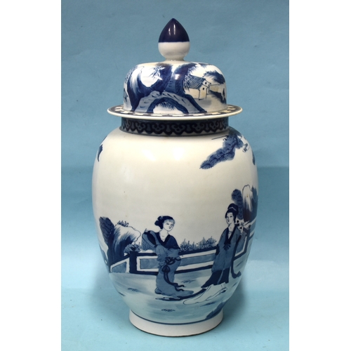 74 - A large Chinese baluster-shaped blue and white jar and lid, with six-character mark beneath.... 