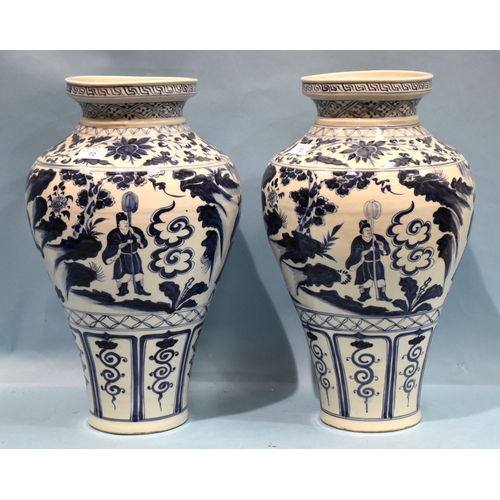 72 - A pair of Chinese large blue and white vases decorated with figures and elephants, 48cm high, (2).... 