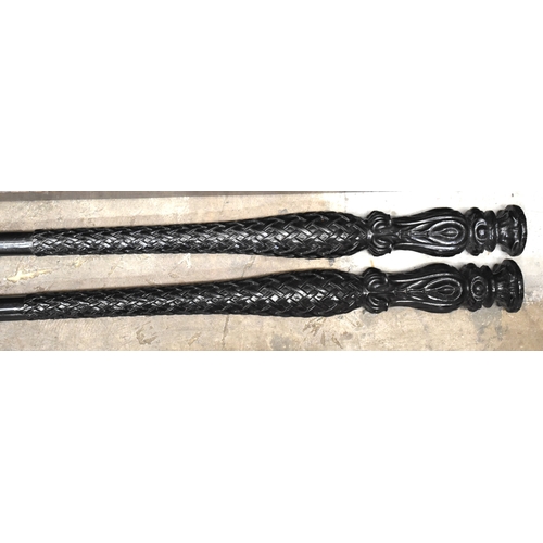 62 - A pair of cast iron corner support pillars, cast with acanthus leaves and interlaced strap-work deta... 