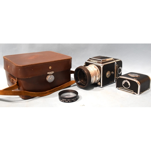A Zenith 80 medium format SLR camera, chrome and black, with Industar ...