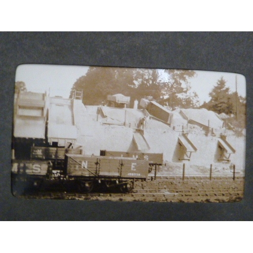 47 - An album of approximately 230 mainly photographic portraits, many with postcard backs, early-20th ce... 