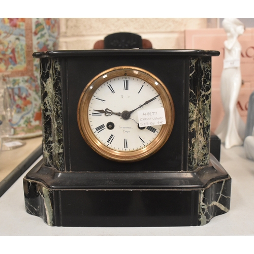 16 - Two black slate striking mantel clocks by Marti, 21cm high, and one other, (3).