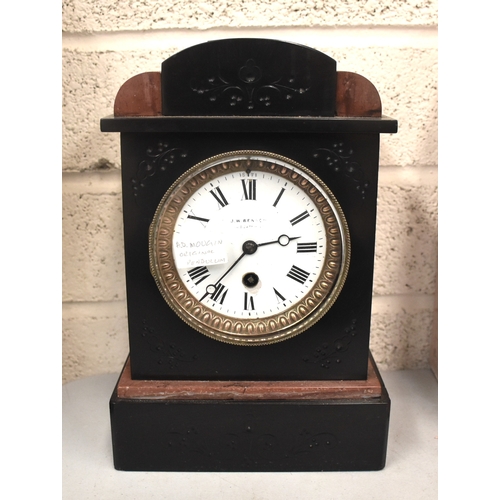 16 - Two black slate striking mantel clocks by Marti, 21cm high, and one other, (3).