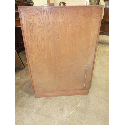 29 - A mid-20th-century-style craftsman-built tallboy, having a single panel door and seven drawers, 77cm... 