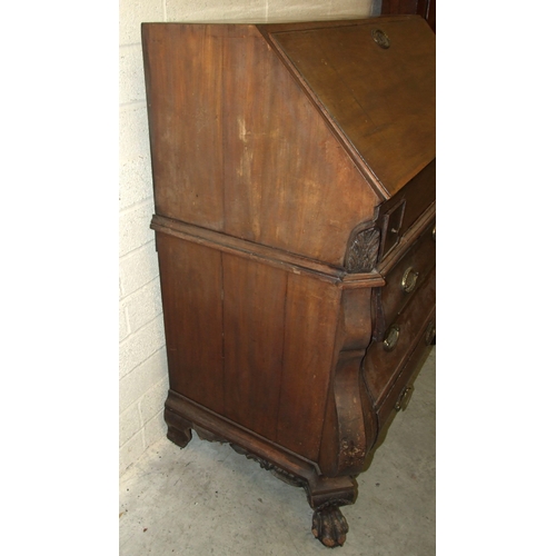 48 - An 18th century Continental mahogany bombe-shaped bureau, the fitted interior with concealed well, a... 