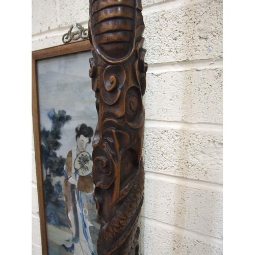 51 - An Oriental carved hardwood lamp stand, 175cm high and an Oriental watercolour of a female figure ho... 