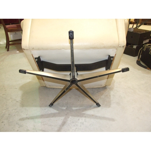 28 - A pair of 1960's/70's generously-seated and buttoned cream leather swivel chairs on five-legged chro... 