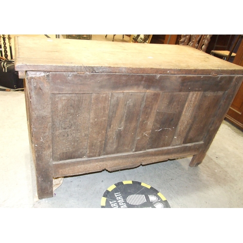39 - An antique oak coffer, the front with four carved panels, 120 x 53cm, 73cm high, together with a pai... 